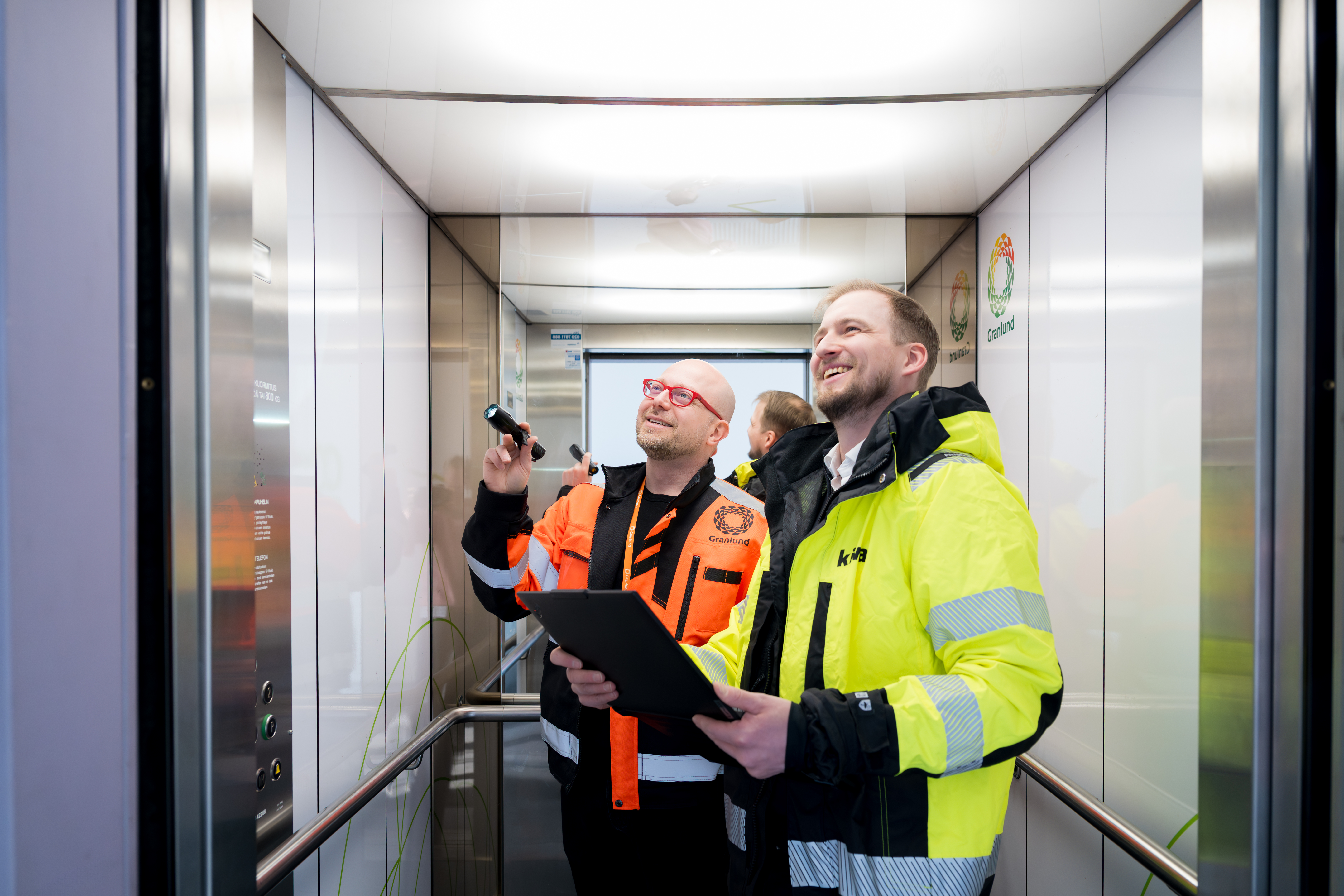 Granlund and Kiwa inspectors auditing an elevator