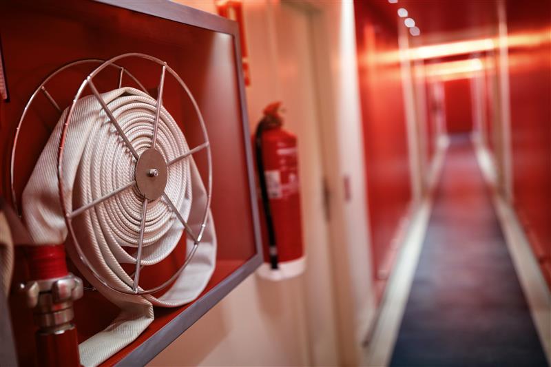 Fire safety equipment in a hallway