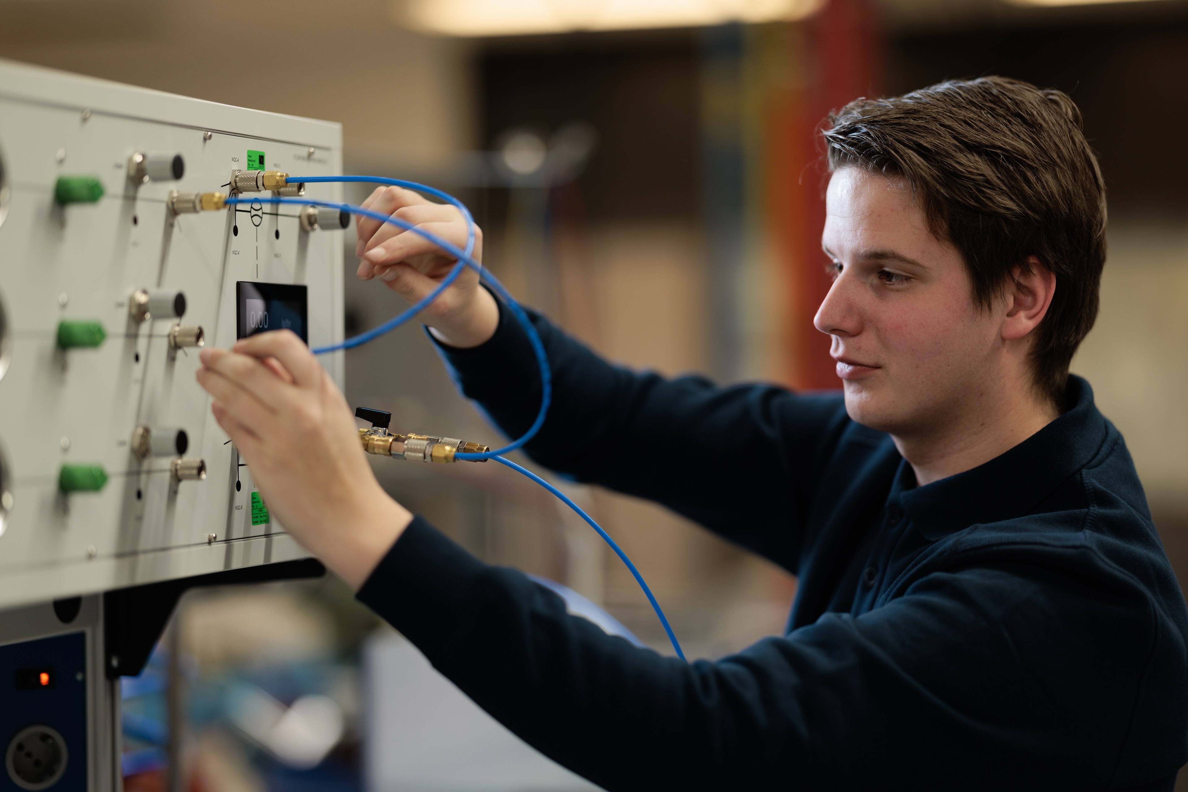 Auditor inspecting electrical equipment