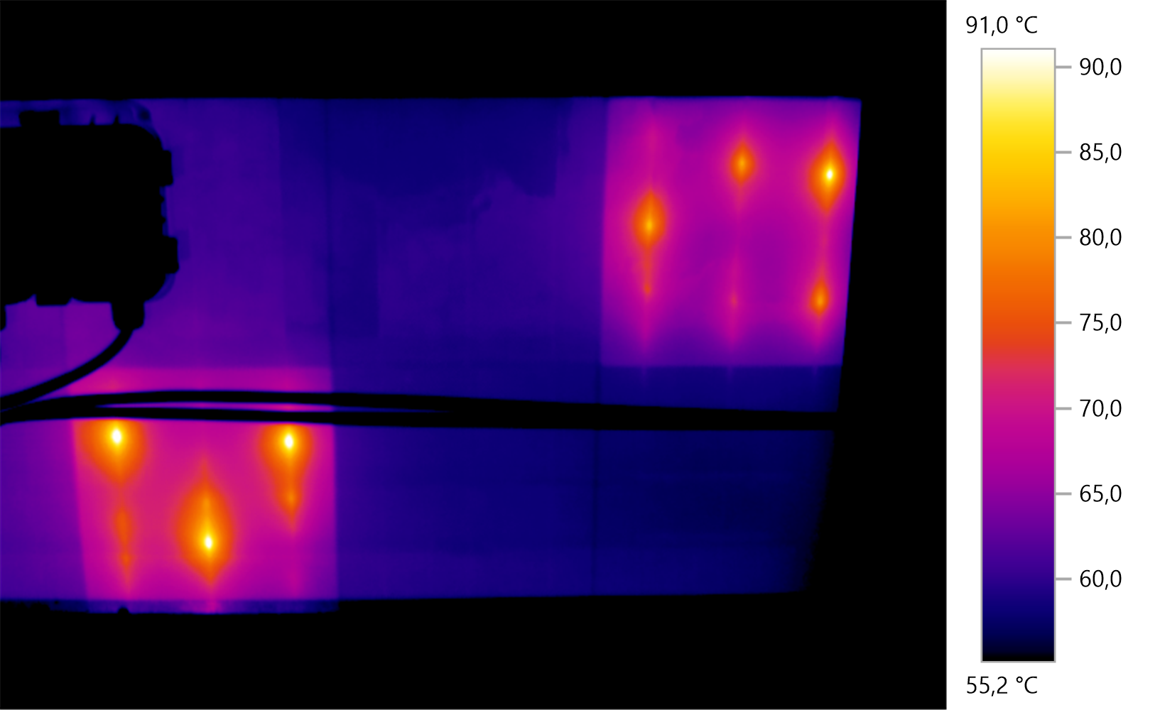 Thermal image showing varying heat levels in a rectangular area with bright orange spots indicating high temperatures, ranging from 55.2°C to 91.0°C, and a color scale on the right